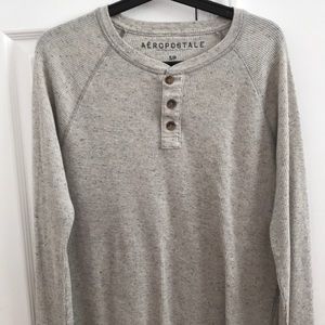 Heather long sleeve. Grey with navy blue speckles.
